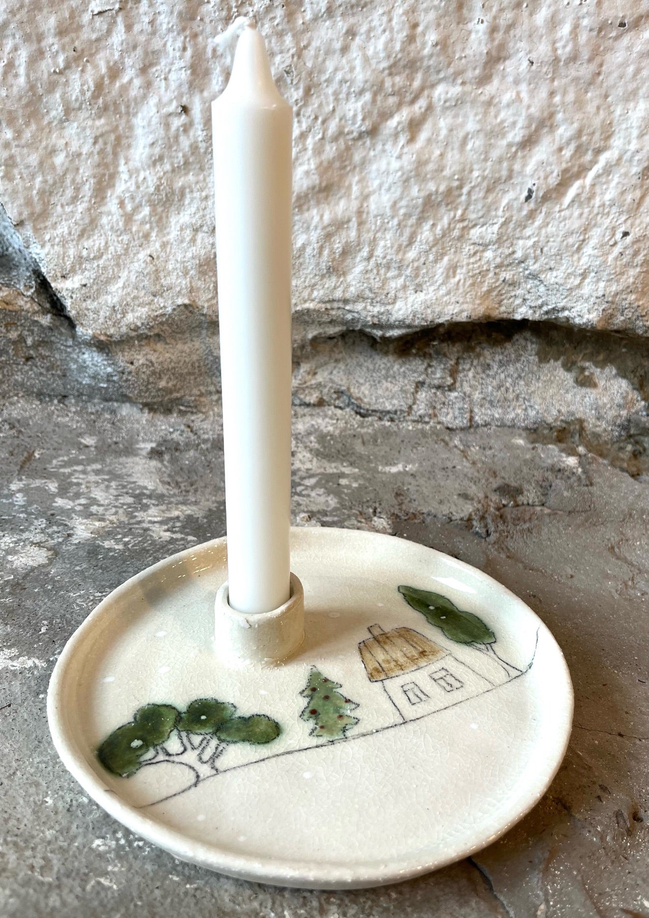 Story- kynttilälautanen